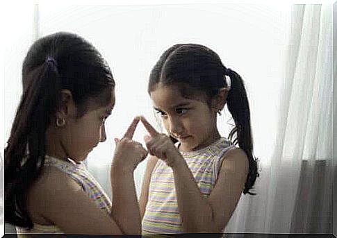 Girl in front of mirror