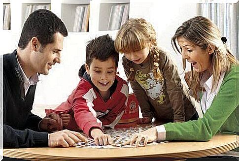 family playing board games to improve focus