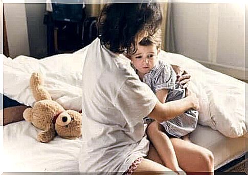 avoid nightmares in children: mother comforts children