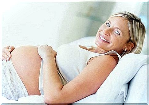 Pregnant woman smiling