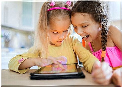 Educational games for children: children at tablet