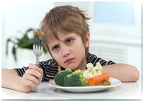 A child who wants to avoid eating his food.