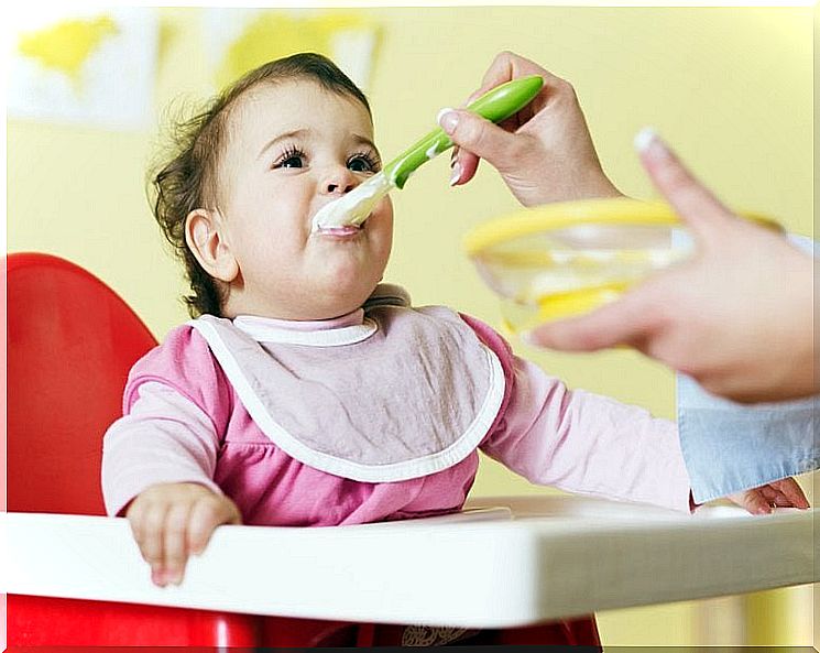 Baby being fed