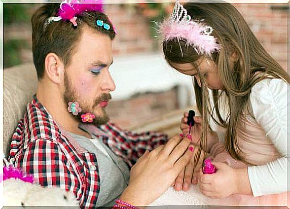 A daughter paints her father's nails