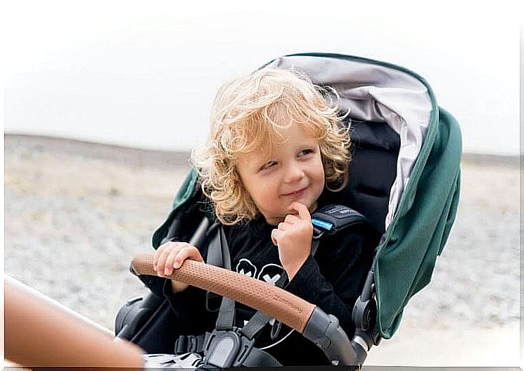 happy girl in pram