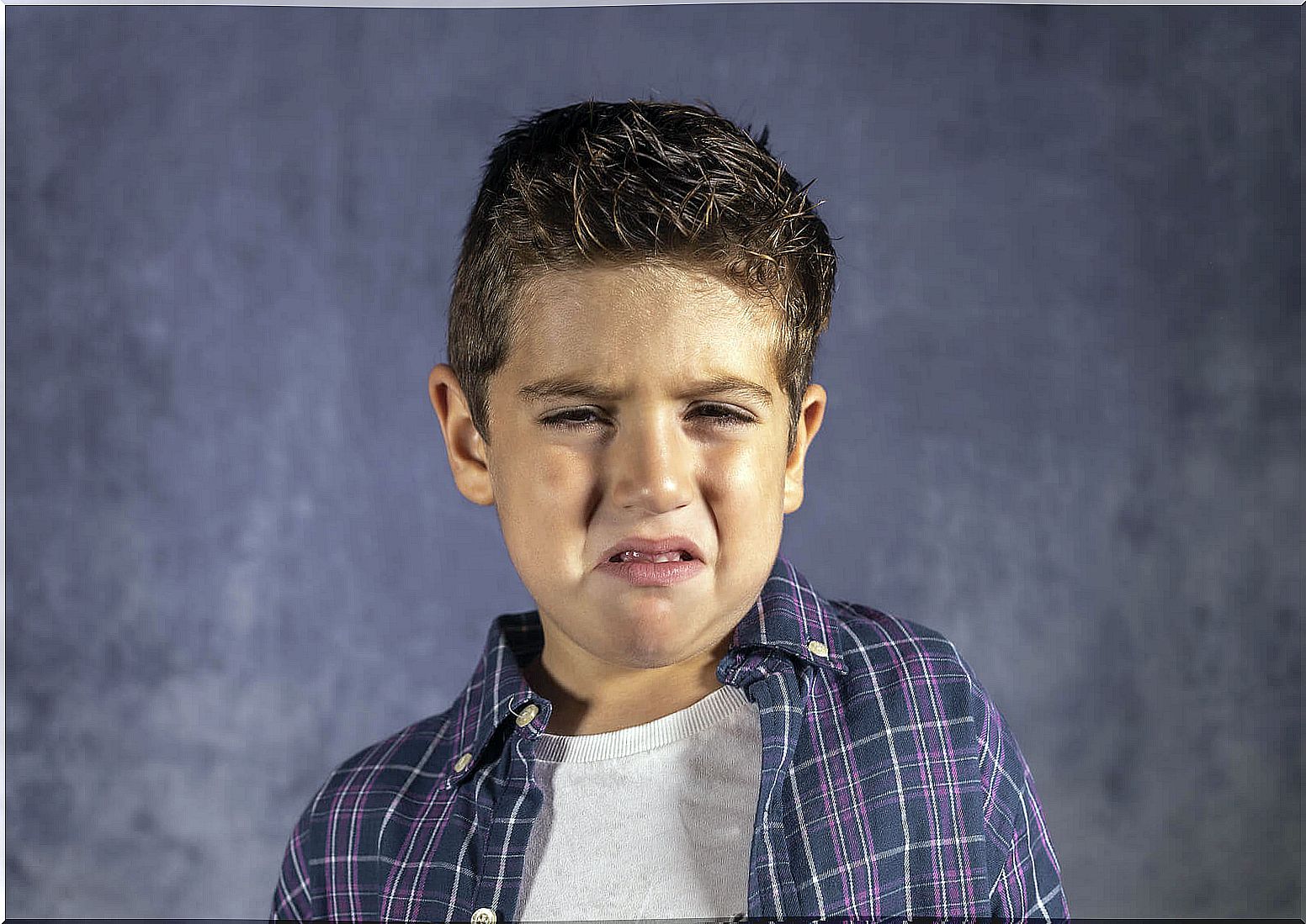 children who are afraid of firecrackers: sad boy