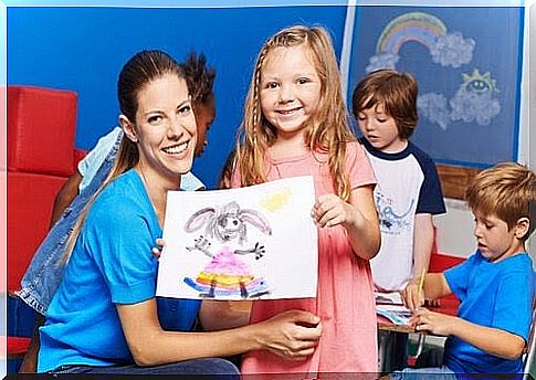 teacher and student with drawings