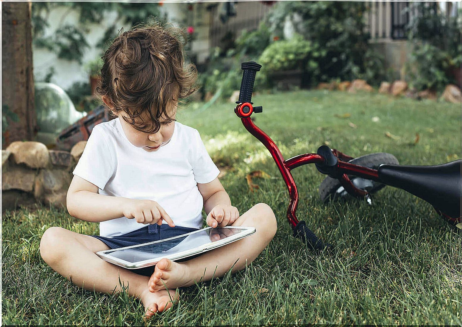 Digital natives: toddler with tablet