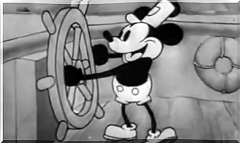 Mickey Mouse steers the boat