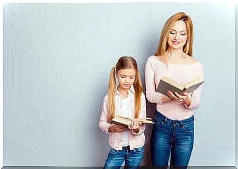 Lead by example: Mother and daughter reading books