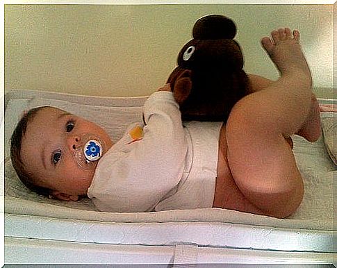 Baby with stuffed animals