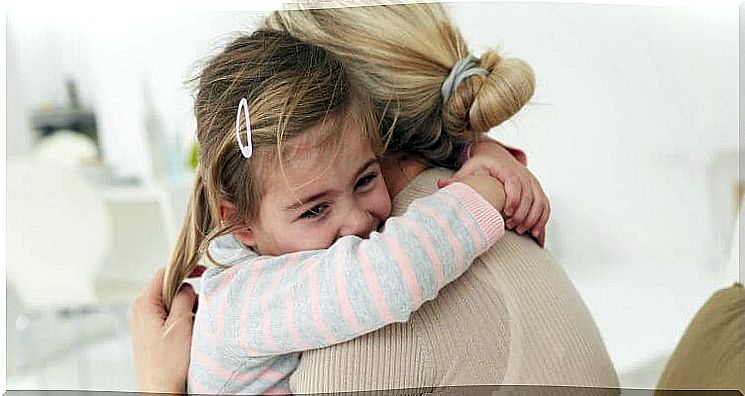 Girl hugging mom.