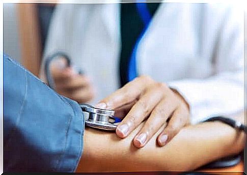 Blood pressure measurement at a doctor.