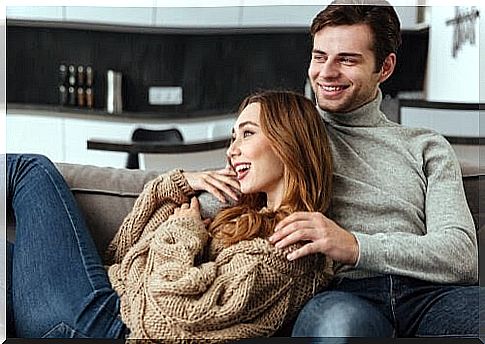 Man and woman on sofa