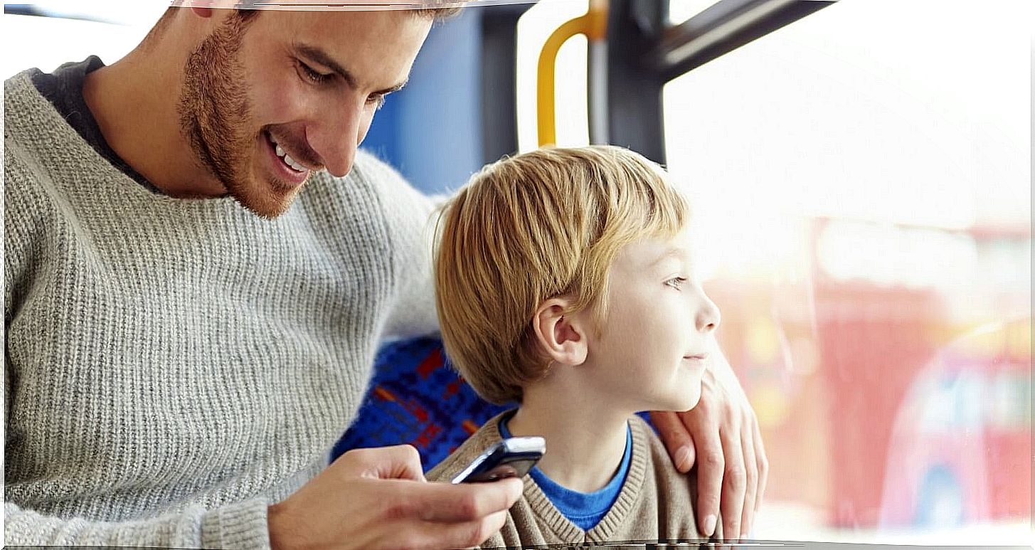 Dad on mobile at the same time as his child